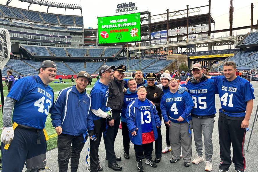 police officers with athletes at the 2022 Special Olympics of Massachusetts