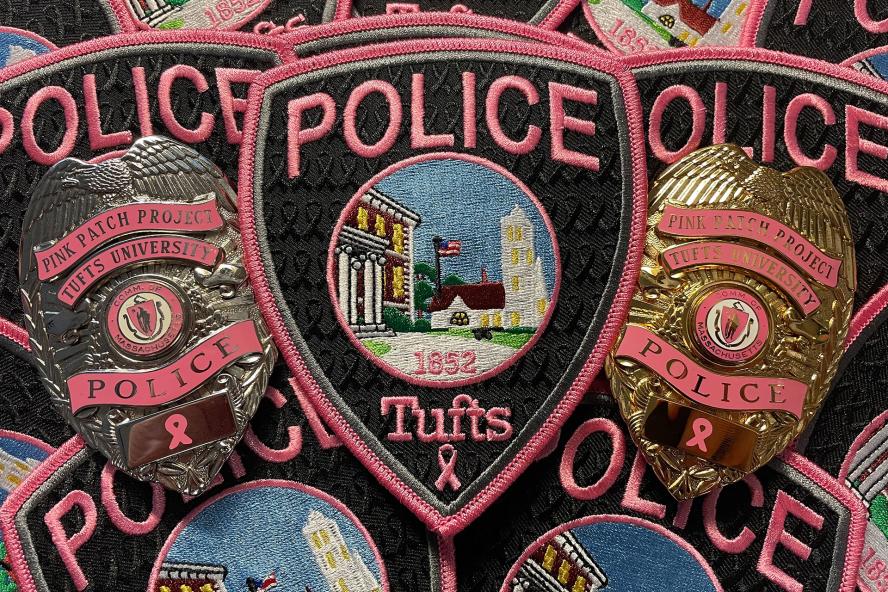 TUPD breast cancer embroidered patches with pink outline.